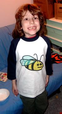 My son Nicky modelling the Big Bee kids baseball jersey with navy sleeves.