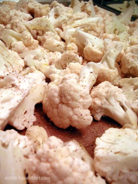 Cut cauliflower waiting to be roasted