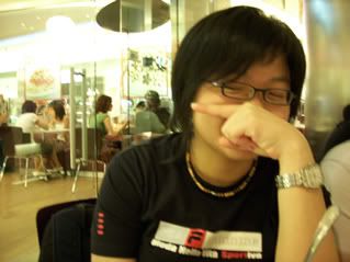 Secretly pointing at somebody Sheena knows