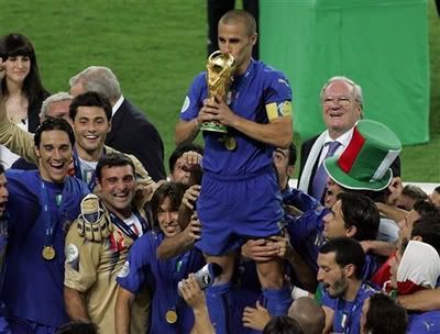 Cannavaro kisses the World Cup trophy