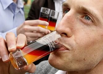 Manuel Goetzendoerfer takes a sip of his so-called Germany Cocktail