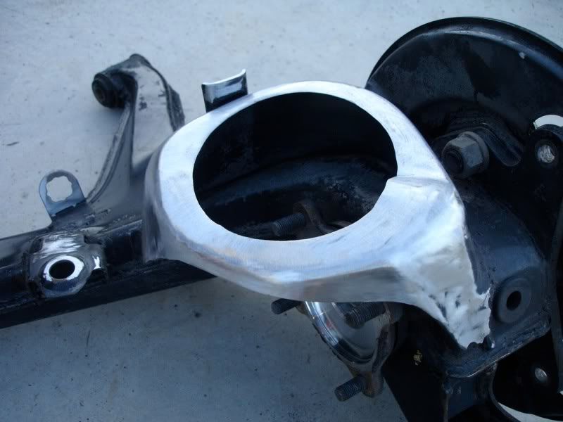 Rear trailing arms modified for standard 55 aftermarket coils
