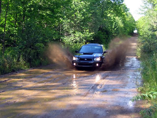 IMAGE: http://i14.photobucket.com/albums/a320/mrludecrs/dirty_wrx_08WEB.jpg