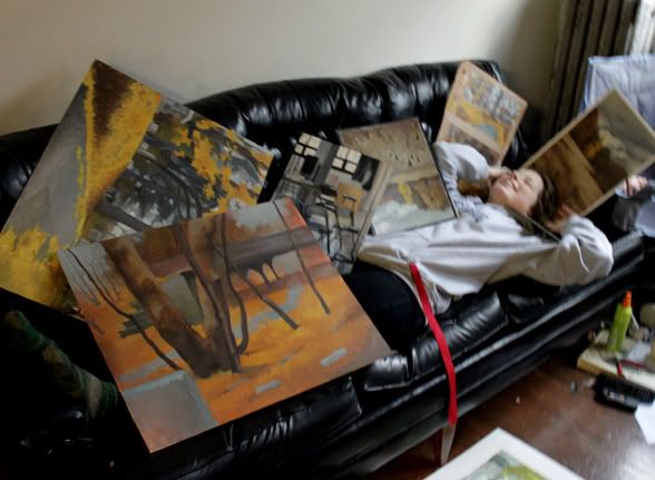 Me on a couch and also paintings