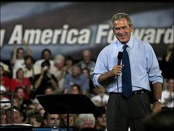 Bush speaking with America Foward in background