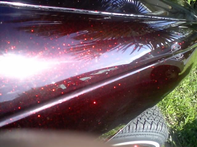 red paint with black flakes